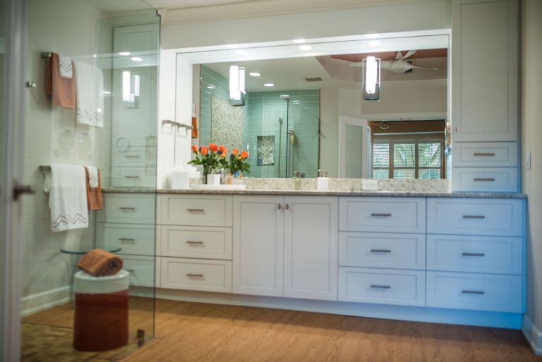 Elegant bathroom with custom bathroom cabinets.